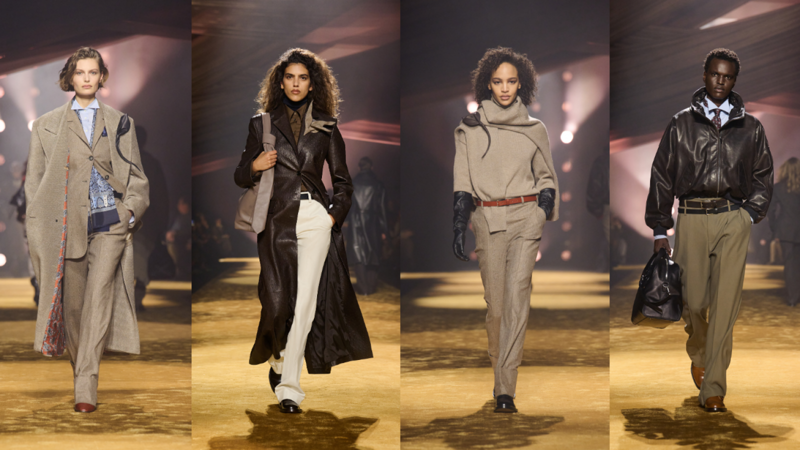 Modelos desfilan en la pasarela de BOSS Otoño/Invierno 2026 con looks de sastrería estructurada, abrigos de cuero y siluetas de hombros marcados en tonos neutros.